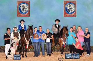 Michael and Brooke posing with the rest of the family after winning 1st and 2nd in the National Championships.