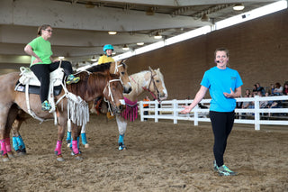 Image of Kelsey Gascon teaching during a Trixie Chicks Riders clinic, sharing valuable equestrian knowledge and skill-building techniques. Experience the expertise of Kelsey Gascon in the art of trick riding.