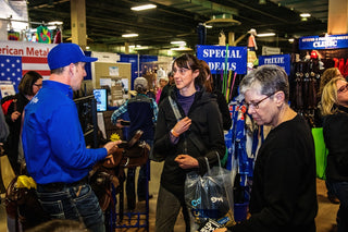 Image of Michael Gascon actively engaging with fans during the Gascon Horsemanship Never Give Up Tour, fostering a sense of connection and camaraderie with the audience.