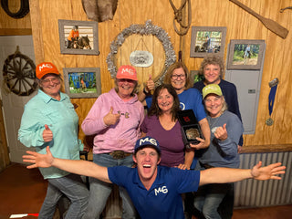 Michael Gascon posing with a group of customers, showcasing a positive interaction and personalized service experience.