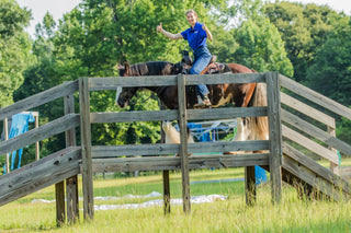 Image of a Horse Help Train-Off contestant confidently navigating through the obstacle course, demonstrating skill and determination.