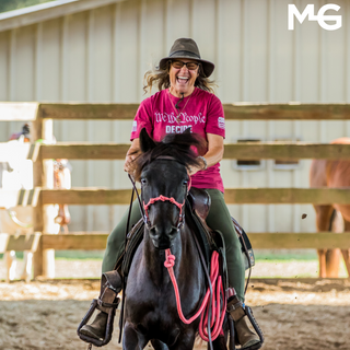 A client with their horse participating in activities during a Horse Help retreat, fostering a bond and learning experience.