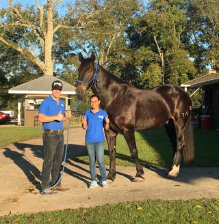 Michael Gascon posing with an intern from the Horse Help internship program, highlighting mentorship and learning opportunities within the equestrian community.