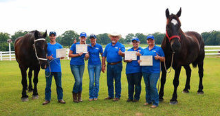 Image of aspiring horse trainers posing with pride and accomplishment after successfully completing the course, marking a significant milestone in their journey towards becoming skilled horse trainers.