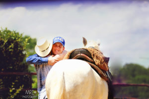 Michael Gascon sharing a heartfelt hug with a satisfied client, reflecting the positive and supportive atmosphere of Gascon Horsemanship sessions.