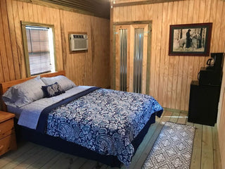 A western-inspired room in the Horse Haven Hotel, offering a cozy and themed accommodation for guests.