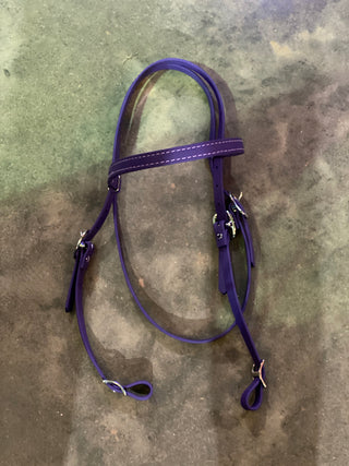 MG Biothane Headstall in purple color, showcasing the durable and weather-resistant material. The image displays the headstall's sleek design, highlighting its versatility and suitability for various equestrian activities.