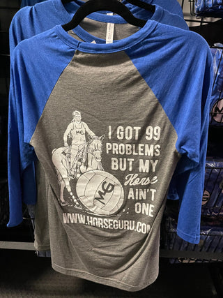 Raglan shirt featuring blue sleeves and a grey body, adorned with the fun slogan 'I got 99 problems but my horse ain't one'.