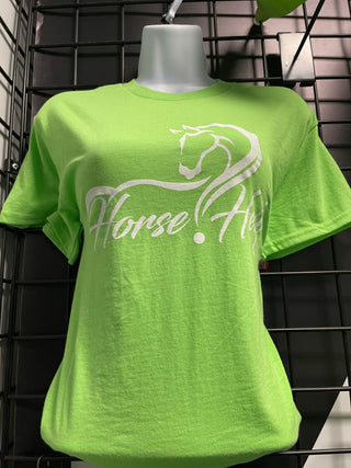 MG Women's Shirt in green with the Horse Help logo. This stylish and comfortable shirt is perfect for horse enthusiasts, showcasing the Horse Help brand by Michael Gascon.