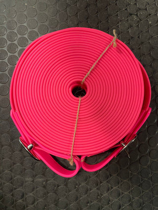 Pink MG Biothane Driving Lines: High-quality Biothane driving lines in vibrant blue color, designed for durability and flexibility. Perfect for practicing driving skills learned from Michael Gascon, the Horse Guru, during Horse Help training sessions.