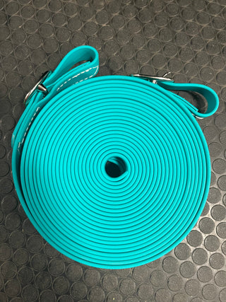 Turquoise MG Biothane Driving Lines: High-quality Biothane driving lines in vibrant blue color, designed for durability and flexibility. Perfect for practicing driving skills learned from Michael Gascon, the Horse Guru, during Horse Help training sessions.