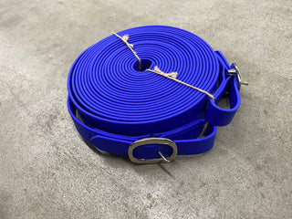 Blue MG Biothane Driving Lines: High-quality Biothane driving lines in vibrant blue color, designed for durability and flexibility. Perfect for practicing driving skills learned from Michael Gascon, the Horse Guru, during Horse Help training sessions.