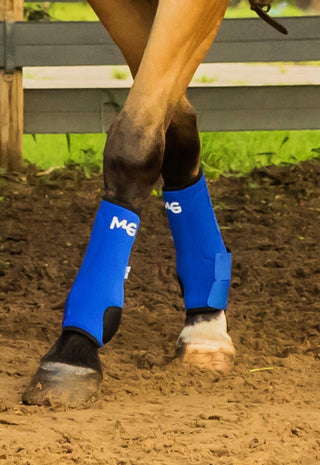 An image of the MG Sports Boots in blue, protective gear for horses valued at $89.99.