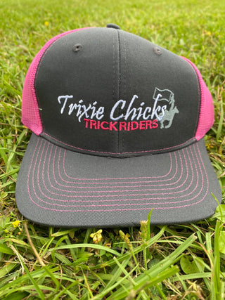 A black Trixie Chicks Trick Riders cap with pink accents, featuring a stylish design and vibrant colors, ideal for trick riding enthusiasts