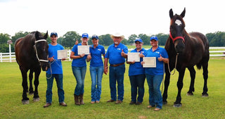 Interns from the Horse Help Internship program proudly displaying their certificates of completion, marking the end of their training journey.