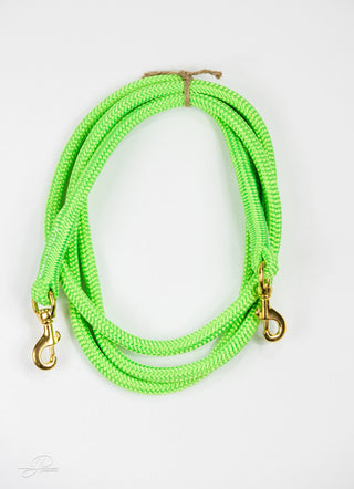 Green MG reins, essential horse tack for communication and control while riding.